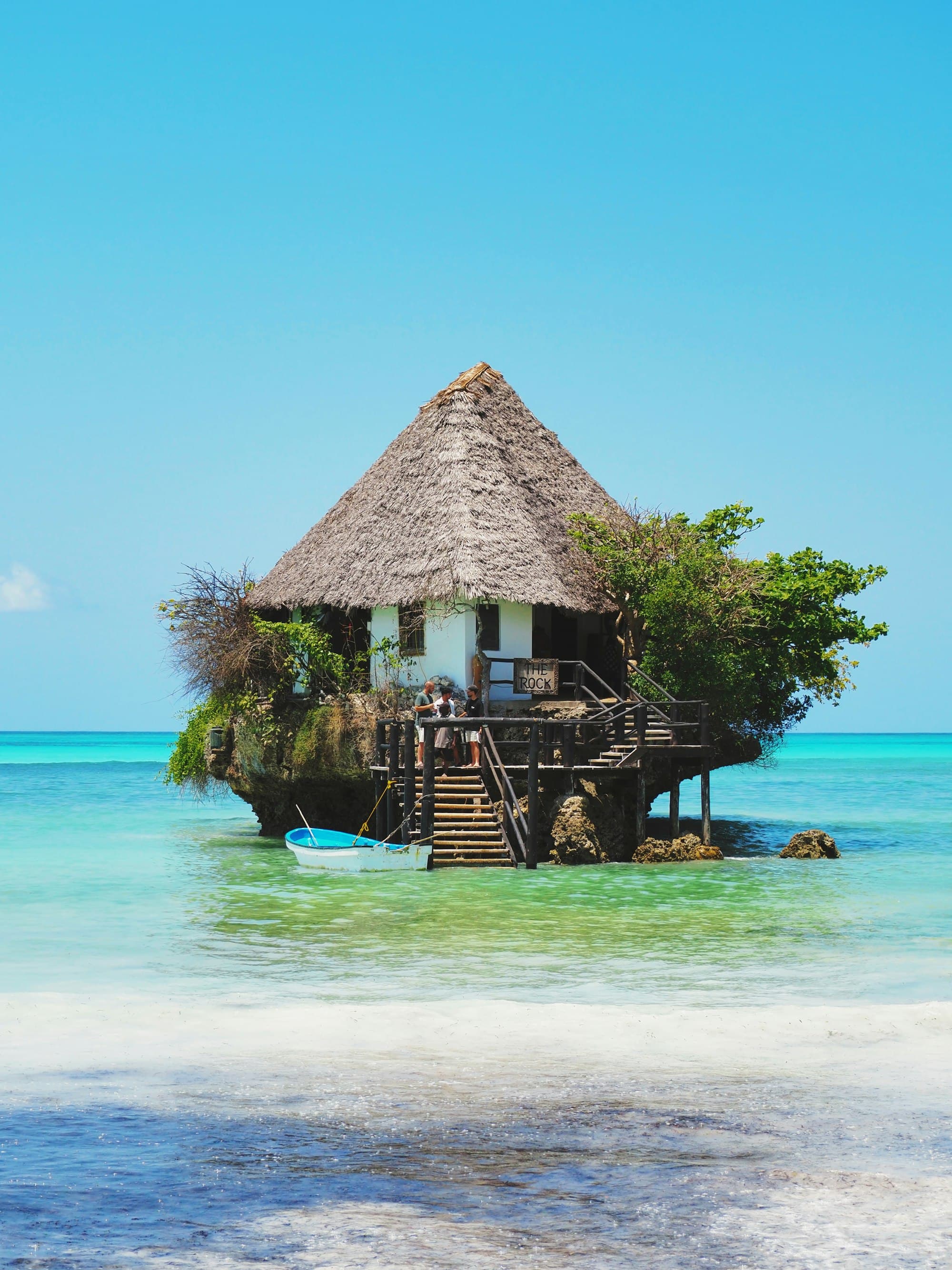 The Rock Restaurant standing on a small rock island in the ocean