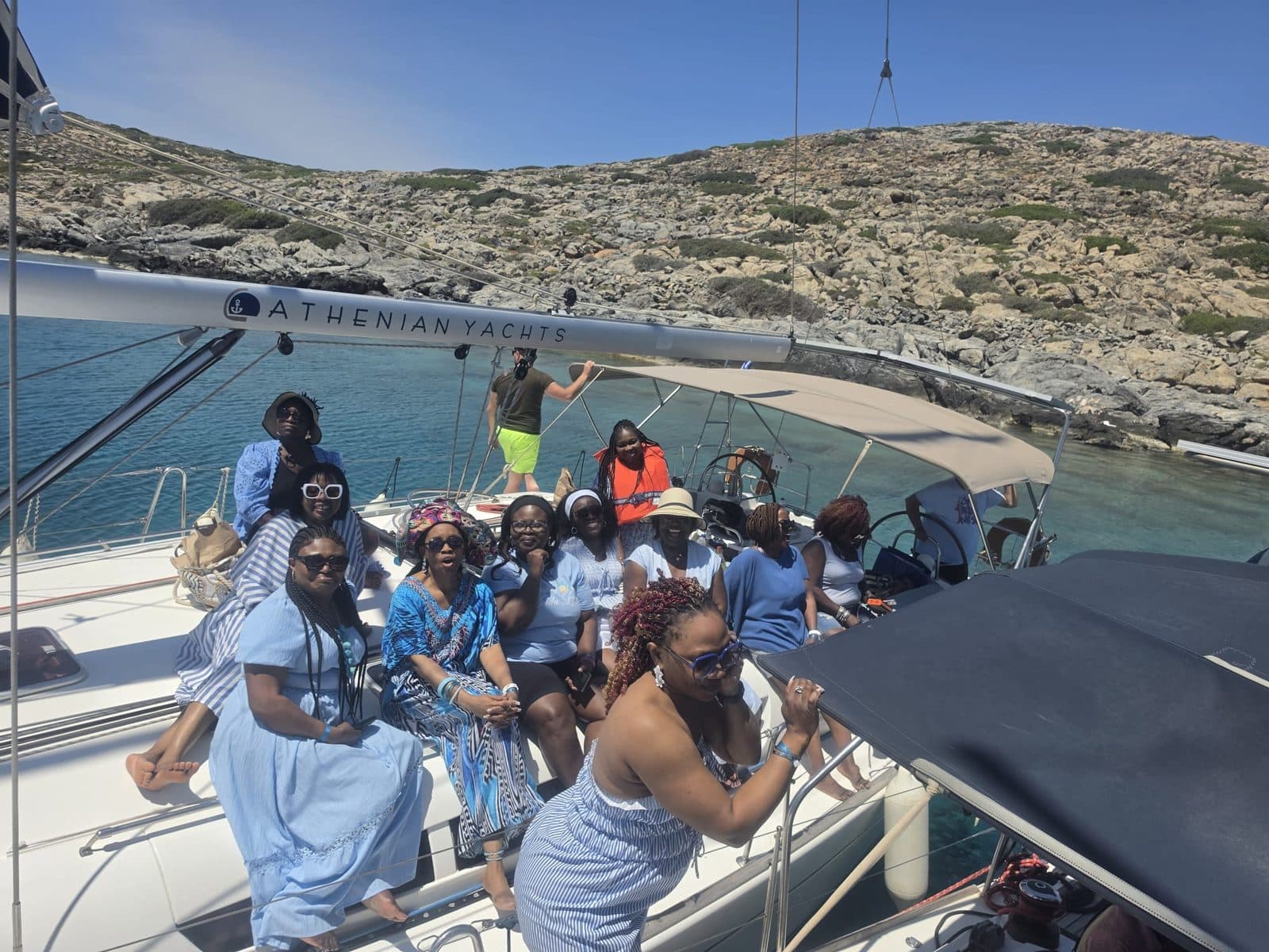 The group together on board the boat